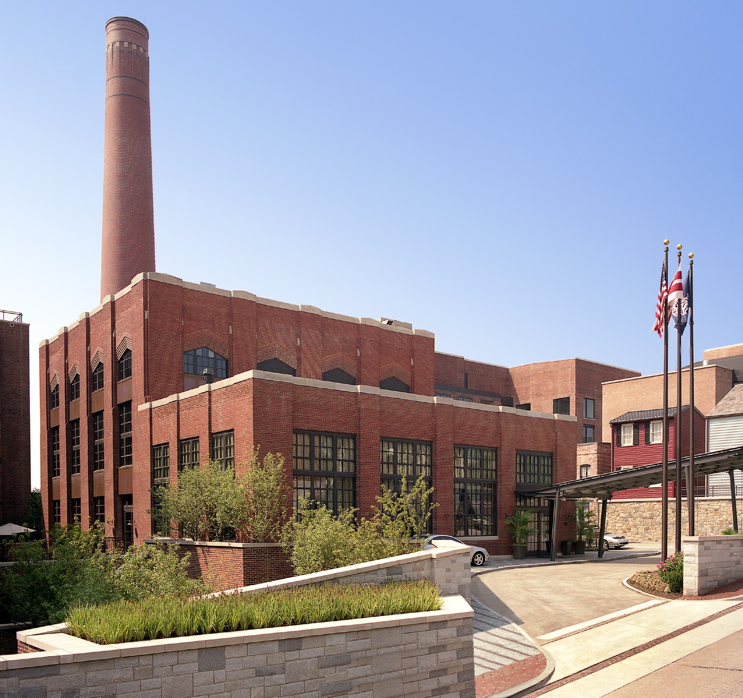 Exterior view of The Ritz-Carlton Georgetown, featuring historic red brick architecture and masonry elements restored and constructed by JD Long Masonry.